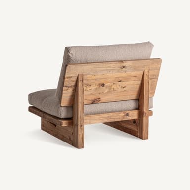 A modern low-profile lounge chair featuring a sturdy, distressed wooden frame and thick, comfortable cushions upholstered in a textured, light beige bouclé fabric. The design is minimalist with visible wood grain. — 3D model