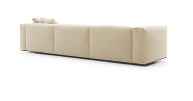 A contemporary three-seater sofa upholstered in a cream-colored boucle fabric. It features a low-profile design with three distinct seat cushions and two loose back cushions, along with wide, block-style arms. The sofa rests on discreet, low-set dark feet. — 3D model