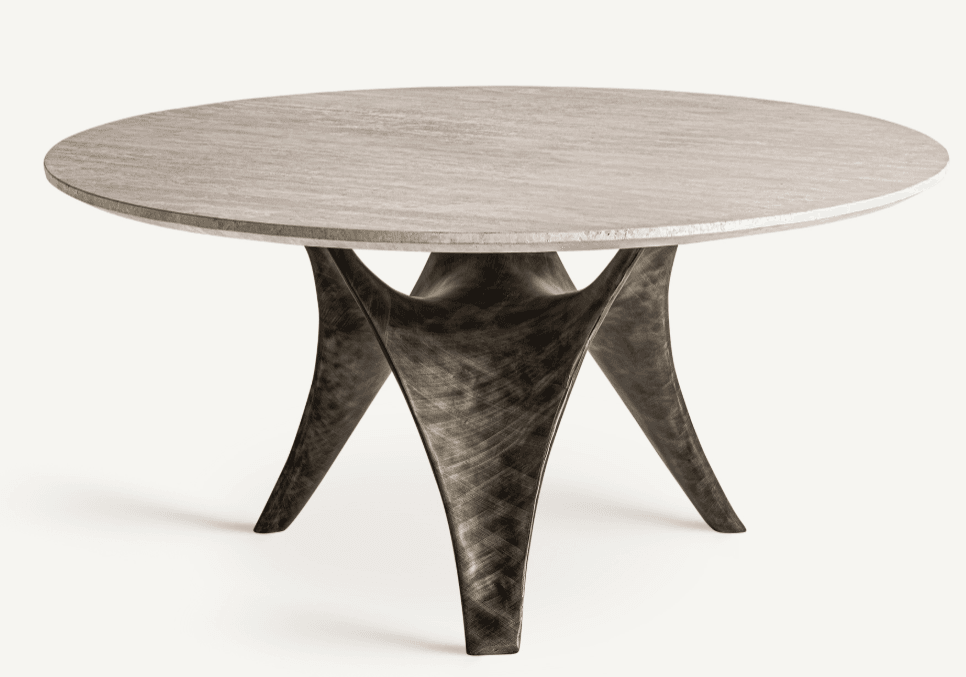 A round coffee table with a light-colored, textured stone or composite top and a unique, sculptural base. The base features multiple curved, organic-shaped legs that twist and converge towards the center, creating a dynamic and artistic silhouette. The finish on the base appears metallic with variations in tone, suggesting a patinated or distressed metal. — 3D model