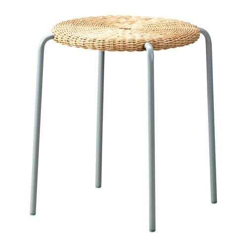 A contemporary stool featuring a circular woven rattan seat and four slender, light gray metal legs. The design is minimalist and functional. — 3D model