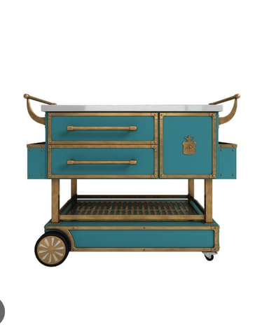 A multi-functional serving cart with a stainless steel top featuring integrated compartments, a grill grate, and drawers. The cart has a white body with gold-toned trim and handles, and it is equipped with wheels for mobility. The drawers are designed for storage, with one drawer holding various glass containers. — 3D model