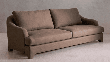 A contemporary three-seater sofa upholstered in a neutral taupe fabric, featuring gently curved arms, two seat cushions, two loose back cushions, and supported by low-profile tapered wooden block feet. — 3D model