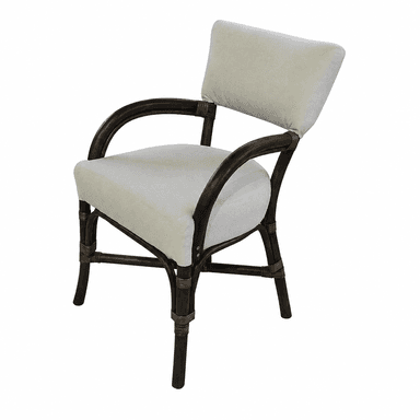 A dark brown rattan armchair with upholstered seat and back cushions in a light cream or off-white fabric. The frame is constructed from curved rattan poles, with a woven detail around the joints of the legs and armrests. The seat cushion is square, and the back cushion is rectangular and slightly angled. — 3D model