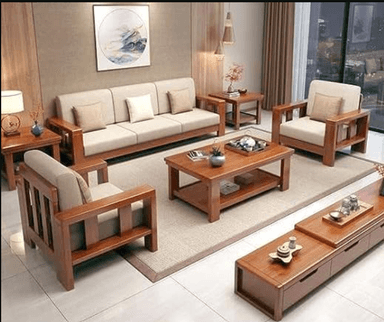 A rectangular coffee table made of wood, featuring a warm, light brown finish. The table has a flat top surface and a matching lower shelf for additional storage or display, supported by four sturdy block legs at each corner. The design is simple and functional, with clean lines. — 3D model