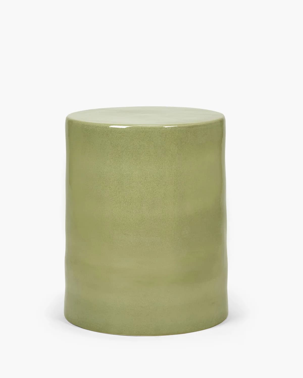 A cylindrical furniture piece, likely a stool or side table, crafted from ceramic with a glossy sage green glazed finish. It features a uniform, drum-like shape with a flat top and base, and slightly irregular, handcrafted-looking sides that reflect light. — 3D model
