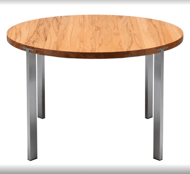 A modern round table featuring a light-toned wooden tabletop with visible grain patterns, supported by four straight, square-profile metal legs in a silver finish. — 3D model