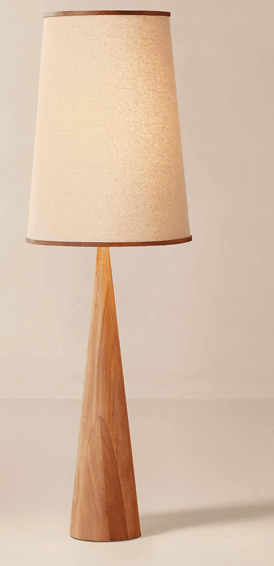 A tall floor lamp with a conical wooden base and a tapered fabric lampshade. — 3D model