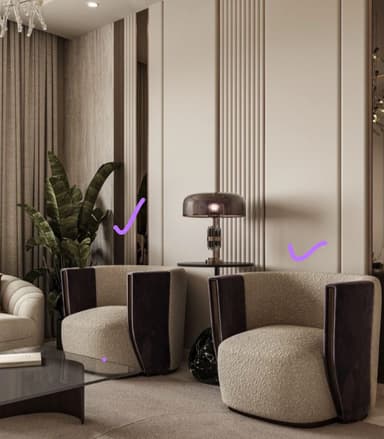A contemporary barrel-shaped accent chair featuring a rounded back and seat, upholstered in a light, textured bouclé fabric. The chair incorporates distinct, curved armrests with dark, possibly lacquered wood or leather panels on the outer sides. It rests on a subtle, recessed dark base. — 3D model