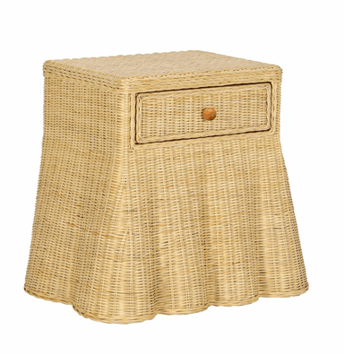A small, square-topped side table constructed entirely from woven rattan or wicker. The upper section is cuboid, transitioning downwards into a flared base with a scalloped edge. The weaving pattern is a tight, uniform weave throughout the structure. — 3D model