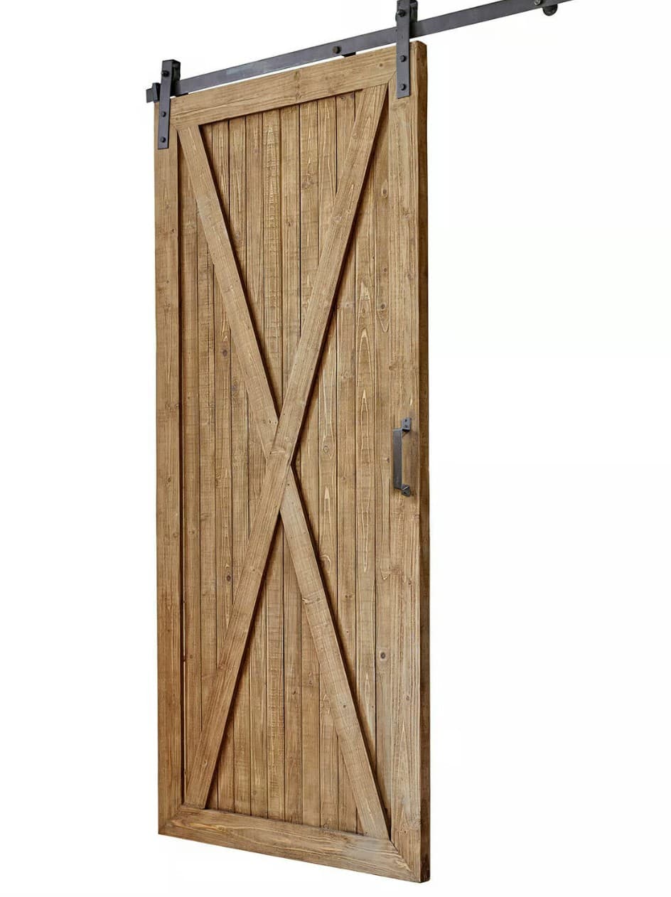 A rustic-style sliding barn door constructed from natural wood planks, featuring a distinctive X-brace design on its front surface. The door is equipped with a black metal sliding track system mounted above it, including rollers and a straight bar pull handle. The wood shows visible grain and a light to medium brown finish, emphasizing its natural character. — 3D model