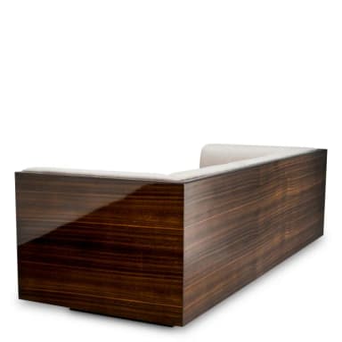 A contemporary three-seater sofa featuring a distinctive glossy dark wood frame that encases light-colored upholstered cushions. The design is sleek and architectural, presenting a modern and refined aesthetic. — 3D model