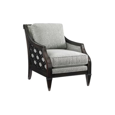 A traditional or transitional style accent chair featuring a dark-stained solid wood frame with intricate geometric fretwork side panels. The chair has upholstered seat and back cushions covered in a light grey fabric with a subtle, tightly woven geometric pattern. The armrests are smoothly curved, and the legs are tapered and slightly splayed at the back, giving it an elegant and sturdy appearance suitable for formal or decorative settings. — 3D model