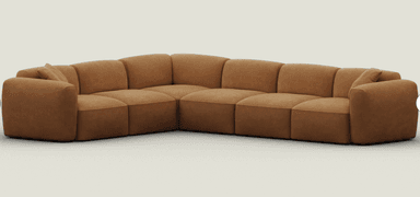 An L-shaped modular sectional sofa featuring a contemporary design with soft, rounded edges and a low profile. The sofa is upholstered in a rich, warm cognac brown fabric, possibly a suede or similar texture, with distinct stitching delineating each module. It comprises multiple individual sections that connect to form the corner configuration, offering ample seating. — 3D model