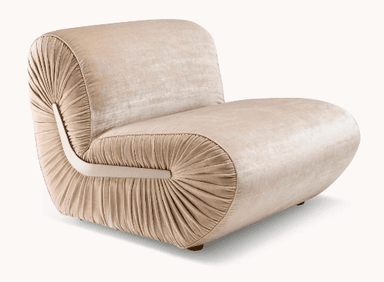 A plush, armless lounge chair upholstered in a light, neutral-toned velvet fabric. The back and front lower half feature a distinctive pleated or gathered design, cinched by a curved, smooth band along the sides, giving it a sculptural and elegant appearance. The chair rests on small, recessed feet. — 3D model
