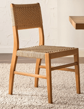 A dining chair with a light wood frame and a woven natural rope seat and backrest, featuring a minimalist design. — 3D model
