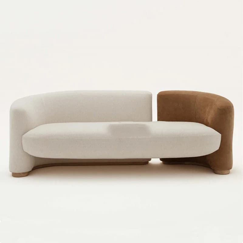 A modern, low-profile sofa featuring an asymmetrical design with two distinct upholstered sections. One section is a curved, armless off-white textile, while the other is a curved, short-armed brown textile. The entire piece has soft, rounded edges and rests on a low, subtly visible wooden base. — 3D model