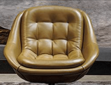 A modern lounge chair with a swivel base. The chair features a distinctive curved shell design upholstered in dark leather. The base is a polished metal four-star pedestal. — 3D model