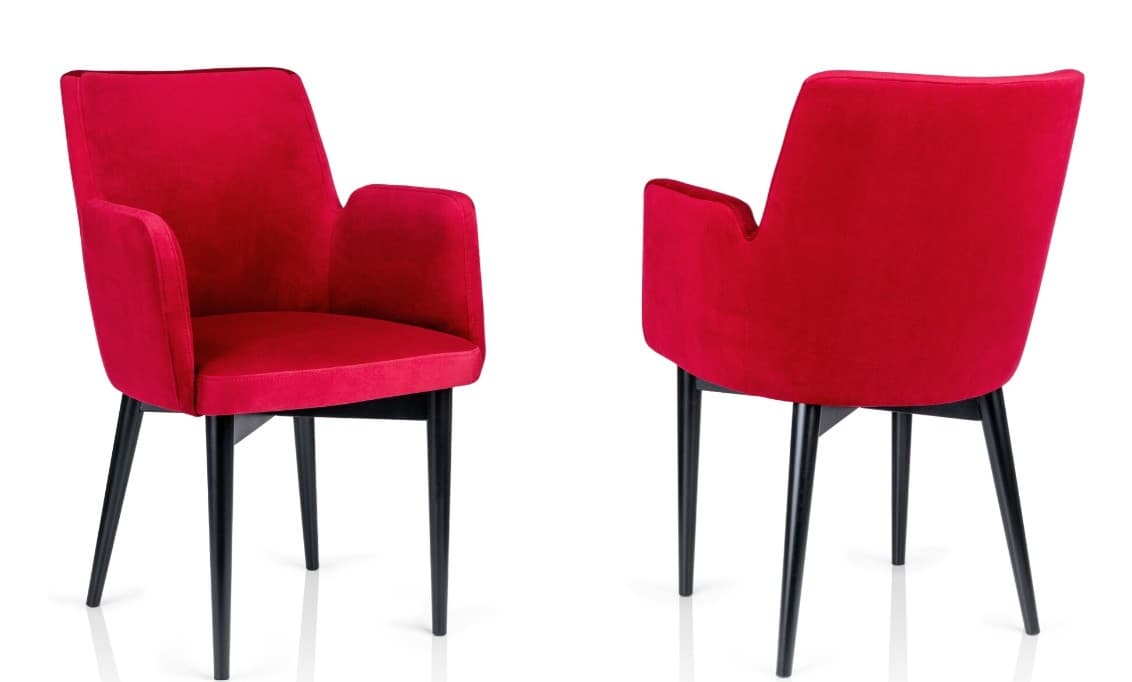 A pair of modern armchairs upholstered in red velvet fabric. The chairs feature a curved backrest that extends into integrated armrests, a seat cushion, and four tapered black legs. The design is minimalist and elegant. — 3D model