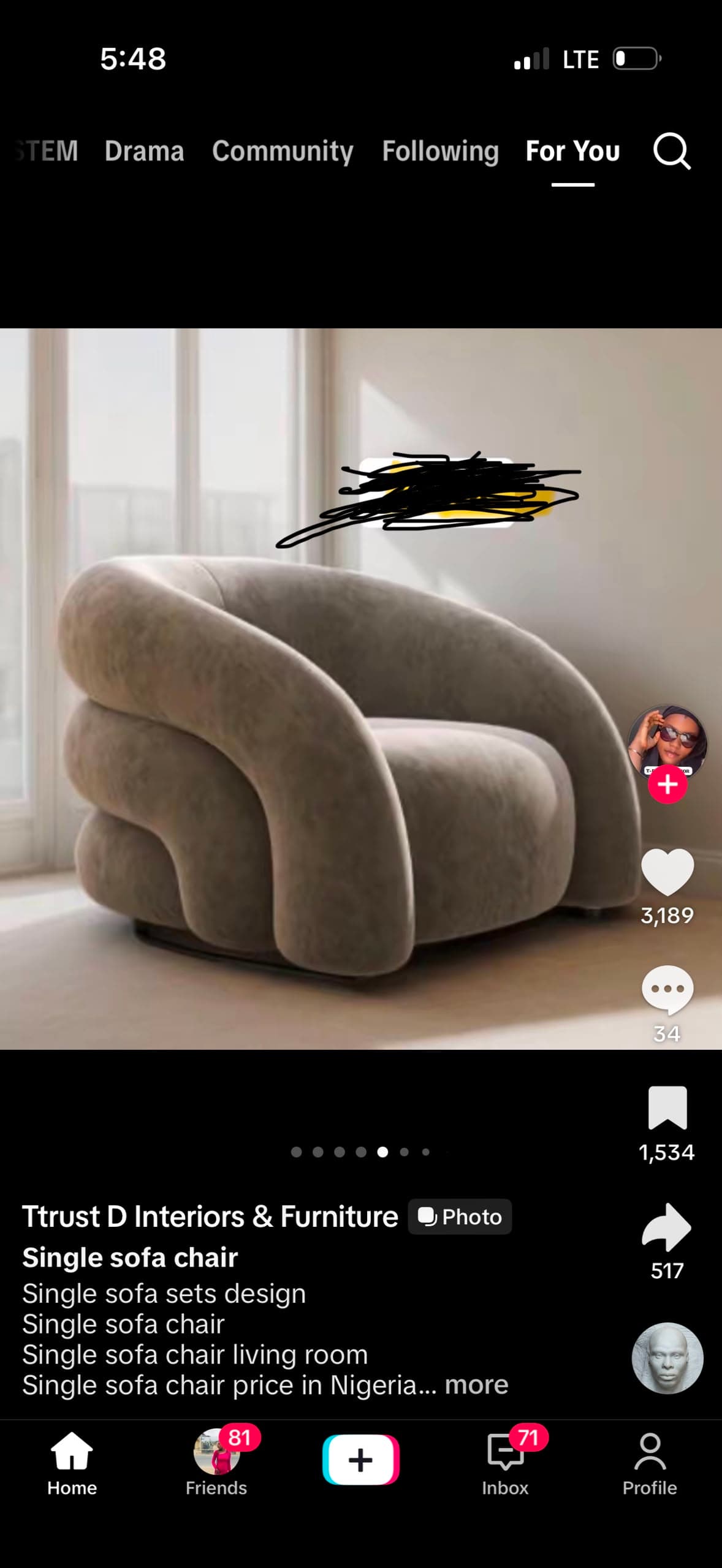 A contemporary single-seater lounge chair characterized by its unique, continuous, and rounded form. The chair is fully upholstered in a light beige or taupe textured fabric, presenting a soft, cloud-like aesthetic. Its design features thick, organic, and curvilinear lines that seamlessly integrate the back, arms, and seat into one voluminous shape. The base is minimally visible, contributing to a grounded yet seamless appearance. — 3D model
