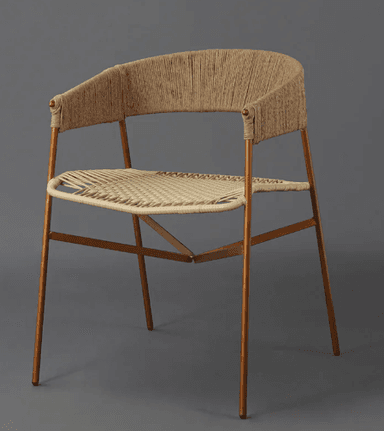 A modern armchair with a distinctive design, featuring a curved backrest and seat made of woven rope and cord. The frame and legs are constructed from metal, giving it a sturdy yet elegant appearance. — 3D model