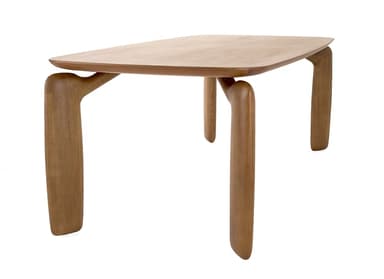 A low, rectangular bench crafted from dark-toned solid wood, likely walnut. It features a thick, smoothly finished top with softly rounded edges. The most striking design element is its four sculptural, curvilinear legs that appear to flow seamlessly from the underside of the bench top, creating an organic and monolithic form. The legs are wide and substantial, tapering slightly before flaring at the base, providing stable support. The overall aesthetic is minimalist yet impactful, highlighting the natural beauty and grain of the wood. — 3D model
