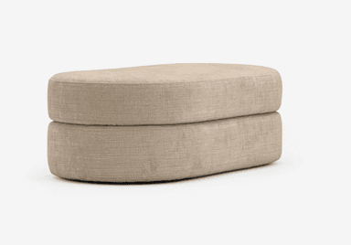 An upholstered two-tier ottoman in a light beige textured fabric, featuring a soft, rounded capsule shape. — 3D model