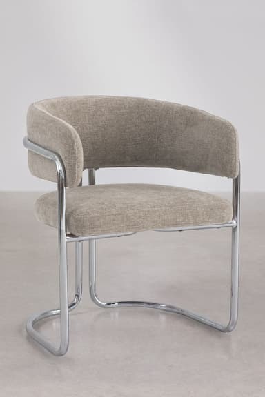 A modern upholstered armchair featuring a curved backrest and seat, supported by a polished chrome tubular steel cantilever frame. The upholstery is a light, neutral-toned fabric. — 3D model