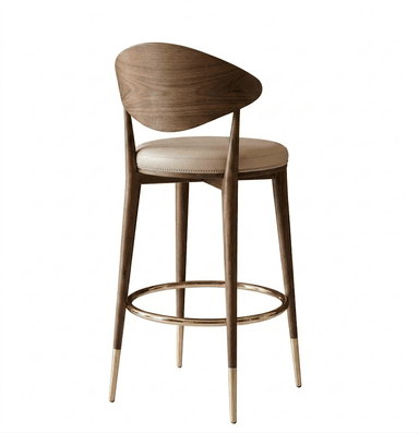 A contemporary bar stool featuring a curved wooden backrest, a padded seat upholstered in light-colored leather, and a wooden frame with four tapered legs. The legs are accented with brass ferrules at the base and a brass circular footrest connecting the front two legs. The seat is detailed with stitching around the perimeter. — 3D model