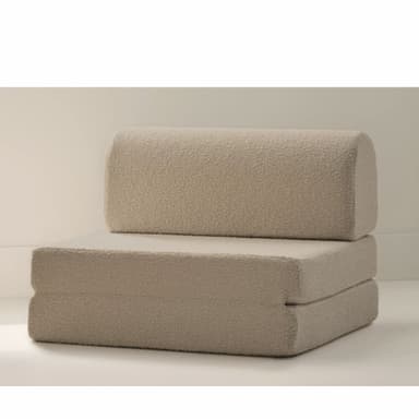 A neutral-toned, beige modular foam chair, constructed from multiple foldable sections, upholstered in a textured fabric. The item is configured as a low-profile chair with a distinct rounded cylindrical backrest positioned atop two stacked, rectangular base sections. — 3D model