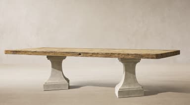 A rectangular dining table featuring a thick, distressed reclaimed wood plank top supported by two sturdy, light gray concrete pedestal bases. — 3D model