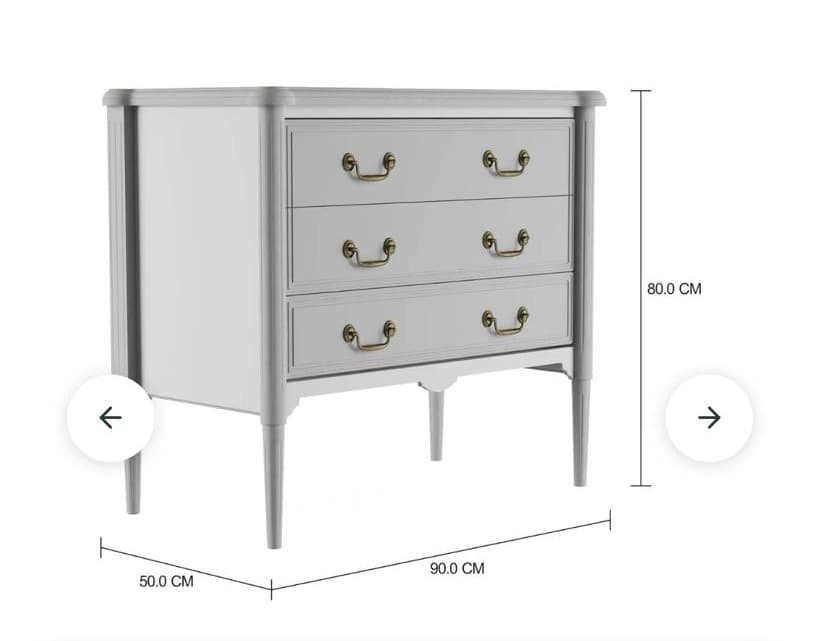 A light grey, neoclassical-inspired chest of drawers featuring three uniformly sized drawers, each adorned with brass-toned pull handles. The chest stands on four tapered legs, and its sides are accented with reeded pilasters, adding a refined touch to its design. — 3D model