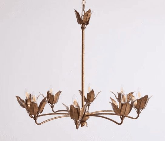 A multi-arm chandelier crafted from gilt metal, featuring a botanical design with leaf-shaped elements. The fixture includes nine light sockets arranged in two tiers on curved arms, all finished in an antiqued gold tone. It is suspended by a decorative chain. — 3D model