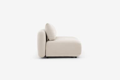 A sectional sofa unit with a low profile, upholstered in a textured, light-colored fabric. The design features rounded armrests and seat cushions, with a modular appearance. Visible stitching details indicate precise construction. The sofa has a contemporary, minimalist aesthetic. — 3D model
