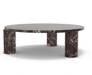 A circular coffee table with a dark marble top and four cylindrical legs made of the same material. The legs are positioned to support the tabletop, with two visible from the front in this view. The marble exhibits a pattern of white veining against a deep reddish-brown background. — 3D model