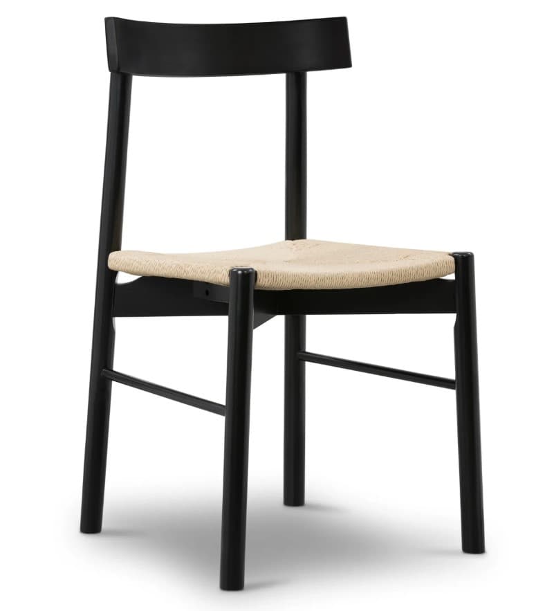 A black wooden dining chair with a woven rush seat and a subtly curved backrest. The chair features a minimalist design with four straight legs connected by horizontal stretchers. The seat appears to be a natural, light-colored woven material. — 3D model