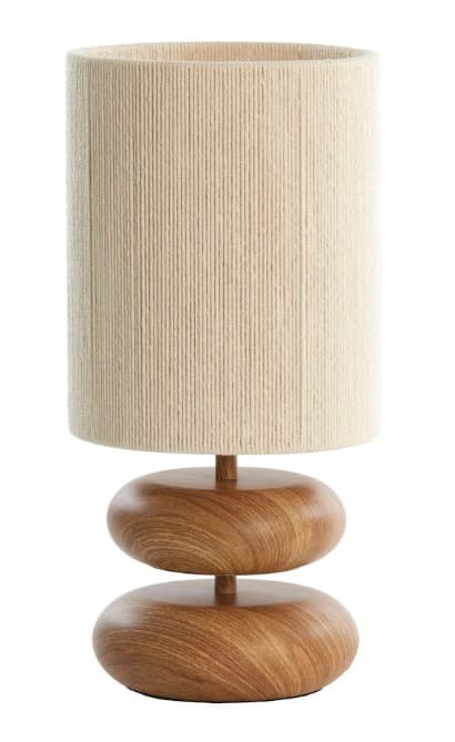 A modern table lamp featuring a stacked organic-shaped wooden base and a cylindrical shade wrapped in textured yarn. The base consists of two rounded, disc-like elements made of wood with visible grain, separated by a slender wooden column. The shade is a light, cream-colored cylinder with a vertically ribbed texture from the yarn wrapping. — 3D model