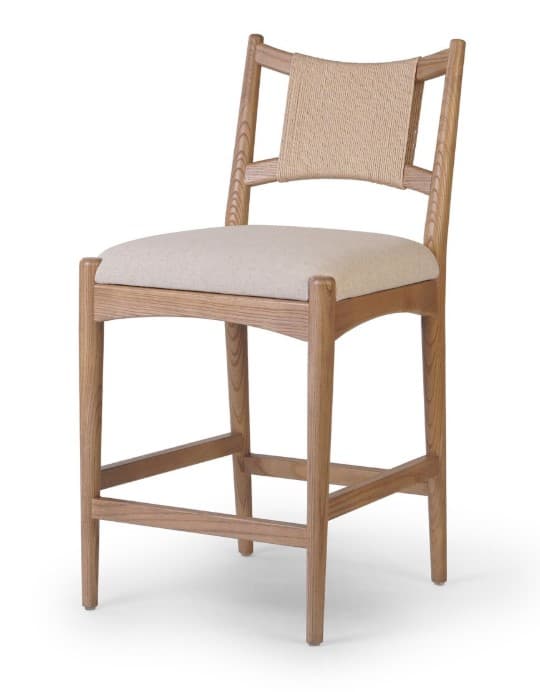 A wooden bar stool with a woven backrest and a cushioned seat. The stool has a clean, modern design with straight legs and a braced footrest. The backrest is made of a light-colored woven material, and the seat is upholstered in a similar neutral fabric. — 3D model