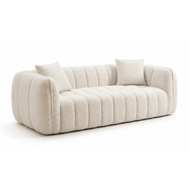 A contemporary off-white boucle channel-tufted sofa with rounded arms and two matching throw pillows. — 3D model