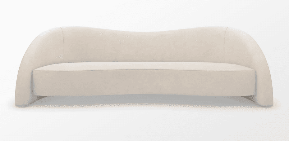 A contemporary sofa featuring a distinctive wavy backrest and seamlessly integrated rounded arms, fully upholstered in a light beige, velvet-like fabric. — 3D model