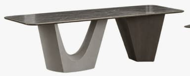 A contemporary rectangular table featuring a dark, veined marble-look tabletop with subtly rounded corners. It is supported by two distinct and asymmetrical bases. One base is a light grey, smoothly curved, sculptural form, while the other is a dark brown, wood-grained, angular, and tapered trapezoidal shape. The contrasting elements create a striking modern aesthetic. — 3D model