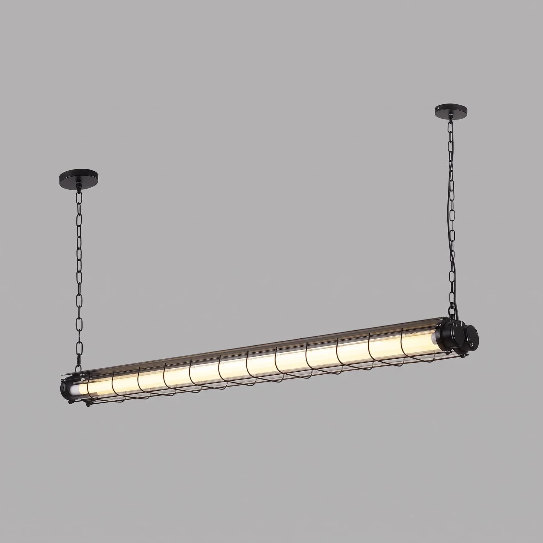 A long, linear black industrial-style pendant light, featuring a protective metal cage around a tubular light source, suspended by two chains from circular ceiling canopies. — 3D model