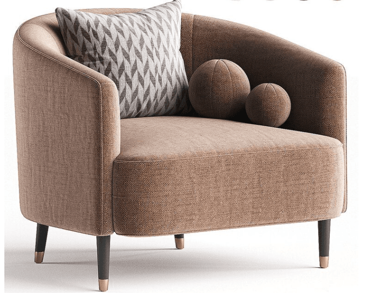 A modern tub-style armchair upholstered in a textured light brown fabric, featuring a curved back and arms that seamlessly integrate into a single form. It is supported by four dark, tapered legs adorned with brass ferrules at the base. The chair includes a patterned square throw pillow and two spherical decorative cushions in a matching fabric. — 3D model