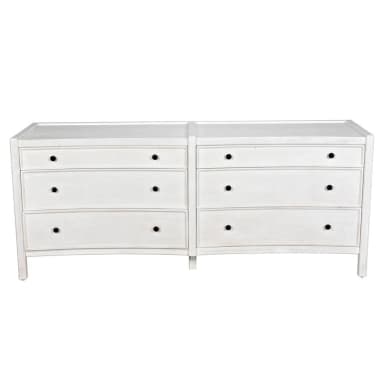 A low, horizontal dresser with two columns of drawers. The left column has three drawers, and the right column also has three drawers. All drawers have simple, dark, circular knobs. The dresser has a slightly curved apron at the bottom. — 3D model