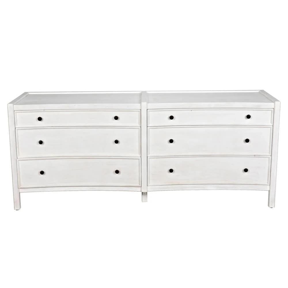 A low, horizontal dresser with two columns of drawers. The left column has three drawers, and the right column also has three drawers. All drawers have simple, dark, circular knobs. The dresser has a slightly curved apron at the bottom. — 3D model
