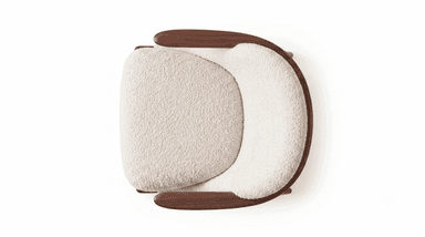 A contemporary lounge chair featuring a sturdy dark wood frame and plush, off-white boucle upholstery. The design incorporates a rounded backrest and integrated armrests, providing a comfortable and enveloping seating experience. The wooden frame includes elegantly tapered legs, contributing to its modern aesthetic. The chair is presented against a clean white background, highlighting its form and texture. — 3D model