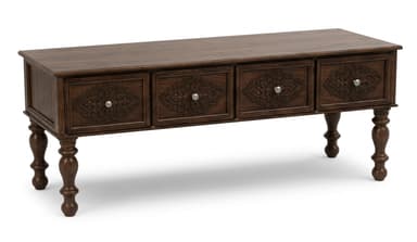 A low-profile media console crafted from dark wood, featuring a long rectangular top and supported by four elegantly turned legs. The front facade is adorned with four individual drawers, each embellished with intricate, mandala-inspired carvings and fitted with small, round, silver-colored knobs. The overall aesthetic suggests a traditional or bohemian influence. — 3D model