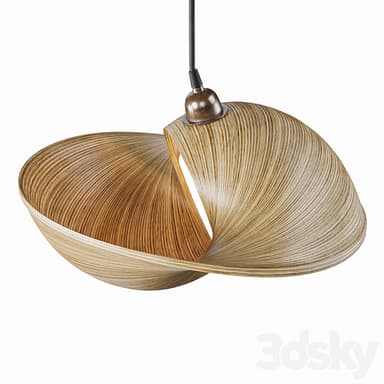 A pendant light fixture featuring an abstract, sculpted shade composed of layered, thin strips resembling wood veneer or a similar natural material. The shade has a dynamic, flowing form with a visible inner core. It is suspended by a dark fabric-covered cord attached to a metallic, antique-finish ceiling canopy. — 3D model