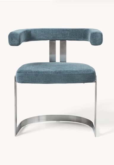 A modern armchair with a metal frame and upholstered seating. The armchair features a curved, open armrest design, a rectangular seat cushion, and a curved sled base. The frame appears to be made of polished metal, possibly stainless steel or aluminum, with a brushed finish. The upholstery is a textured fabric in a deep teal or blue-green hue. — 3D model