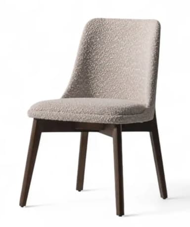 A contemporary armchair with a textured boucle fabric upholstery and dark wooden legs. The chair features a gently curved backrest that extends into the seat, and four tapered legs providing stable support. The overall design is minimalist and elegant. — 3D model