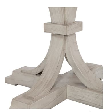 A round pedestal dining table with a light-colored finish. The table features a thick, banded tabletop with a subtle beveled edge. The pedestal base consists of a central square column from which four curved supports fan out, connecting to a wider, rectangular base with decorative moldings. The overall design suggests a transitional or modern farmhouse style. — 3D model
